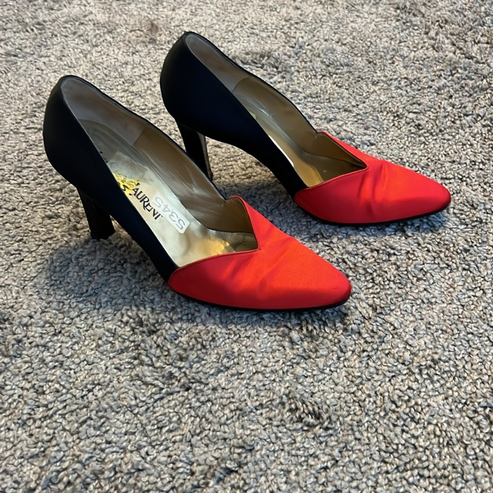 Black and red Yves St Laurent shoes.